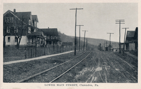 Postcard showing Lower Main Street, Clarendon