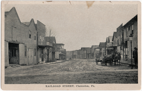 Clarendon postcard with a view of Railroad Street