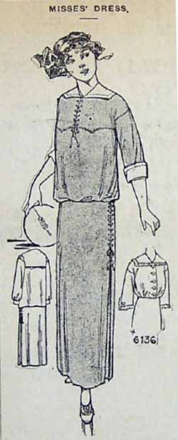 1913 dress for young girl, 2 piece, loose top, cross stitched on skirt sides and front bodice area